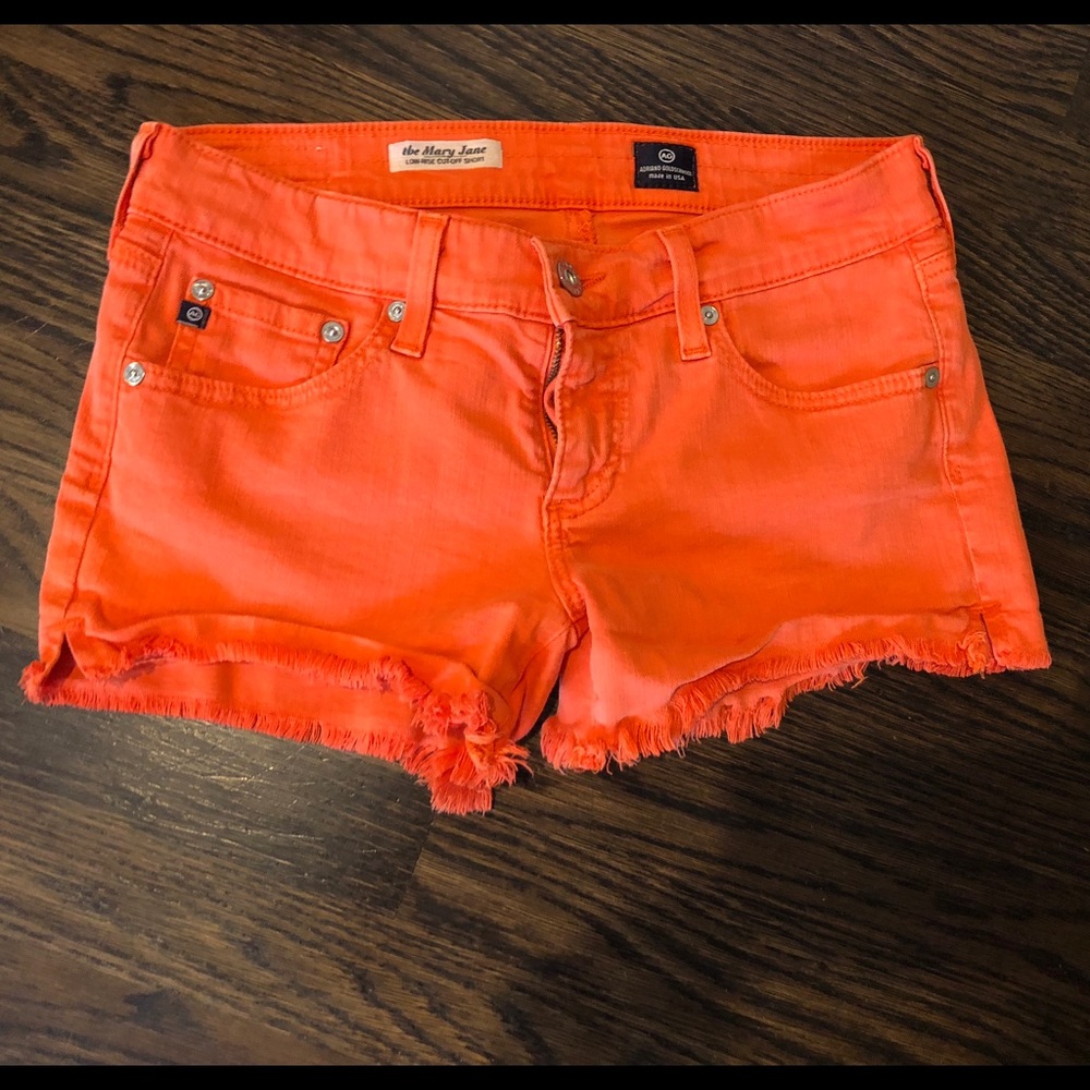 AJ orange denim cut offs